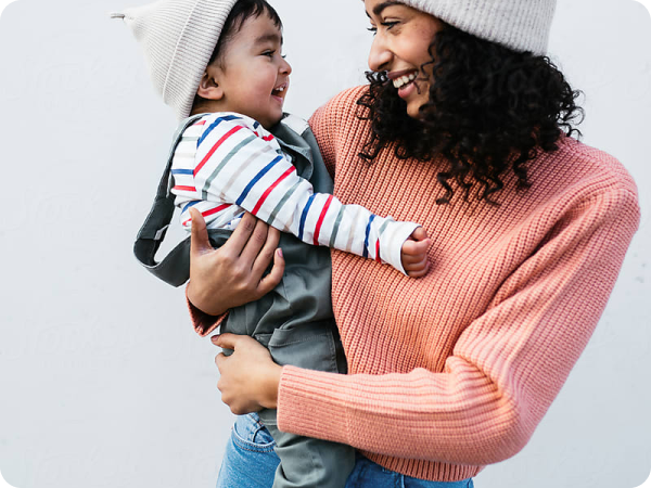 Woman holding baby in her arms